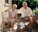 Couple Sitting Outdoors