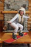 Frau Snowboarden auf Tabelle