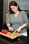 Woman Cutting Vegetables