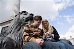 Couple in Trafalgar Square, London, England