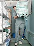 Hospital Worker Carrying Supplies