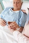 Nurse Giving Medicine to Patient