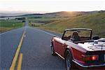 Woman Driving on Rural Highway, Black Diamond, Alberta, Canada