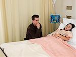 Man and Girl in Hospital Room