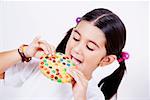 Close-up of a girl eating a pie