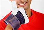 Portrait of a young man showing Thumbs Up sign