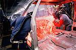 Workers weld car bodies, Chrysler plant, Newark, Delaware