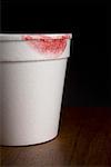 Close-up of a lipstick mark on the disposable cup