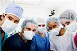 Portrait of surgeons standing in an operating room