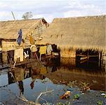 Huts in a flooded village, Siem Reap, Cambodia