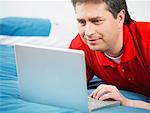 Close-up of a mature man using a laptop