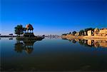 Reflection of a temple in a lake, Gadsisar Lake, Jaisalmer, Rajasthan, India