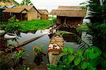 High angle view of a boat in front of a house in a flooded village, Siem Reap, Cambodia