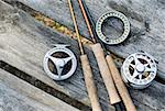 High angle view of fishing rods with fishing reels