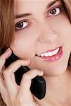 Portrait of a businesswoman talking on a mobile phone and smiling