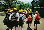 Group of schoolgirls walking on the road, Kyoto Prefecture, Japan