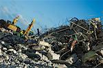 Low angle view of earth movers at a construction site