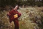 Young woman smiling in traditional Japanese clothing, Kamakura, Kanagawa Prefecture, Japan