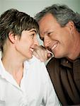 Close-up of a mature couple smiling