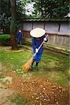 Two people cleaning a garden, Kenrokuen Garden, Kanazawa, Ishikawa Prefecture, Japan