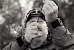 Close-up of a mature man holding a fishing rod