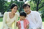 Family, smiling at camera, portrait