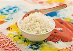 Bowl of long grain white rice with spoon