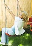 Senior woman on swing