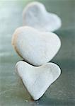 Heart shaped stones in line