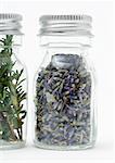 Bottles of dried flowers and herbs