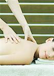 Woman having back massage