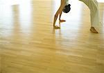 Yoga class, woman doing backbend