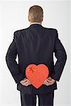 Businessman Holding Heart-Shaped Box