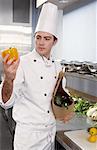 Chef Looking at Yellow Pepper