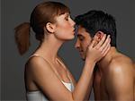 Woman Kissing Man's Forehead