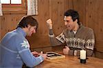 Two Men Playing Backgammon