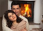 Couple by Fireplace