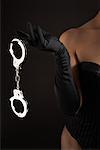 Woman Holding Handcuffs