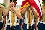 US Soldiers Carrying Flags at Memorial Day Parade