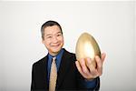 Businessman with Golden Egg
