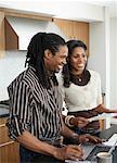 Couple with Laptop Computer