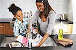 Sisters Washing Dishes