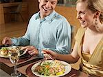 Couple Sitting at Dinner Table