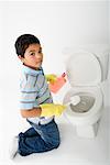 Boy Cleaning Toilet