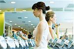 Two women working out with dumbbells