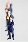 Businessmen figurines standing in a row