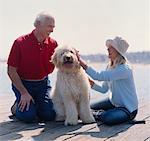 Couple with Dog on Wharf