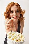 Woman Eating Popcorn