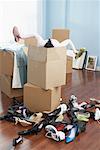 Woman Unpacking Shoes in New Home