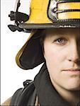 Portrait of a female firefighter close up